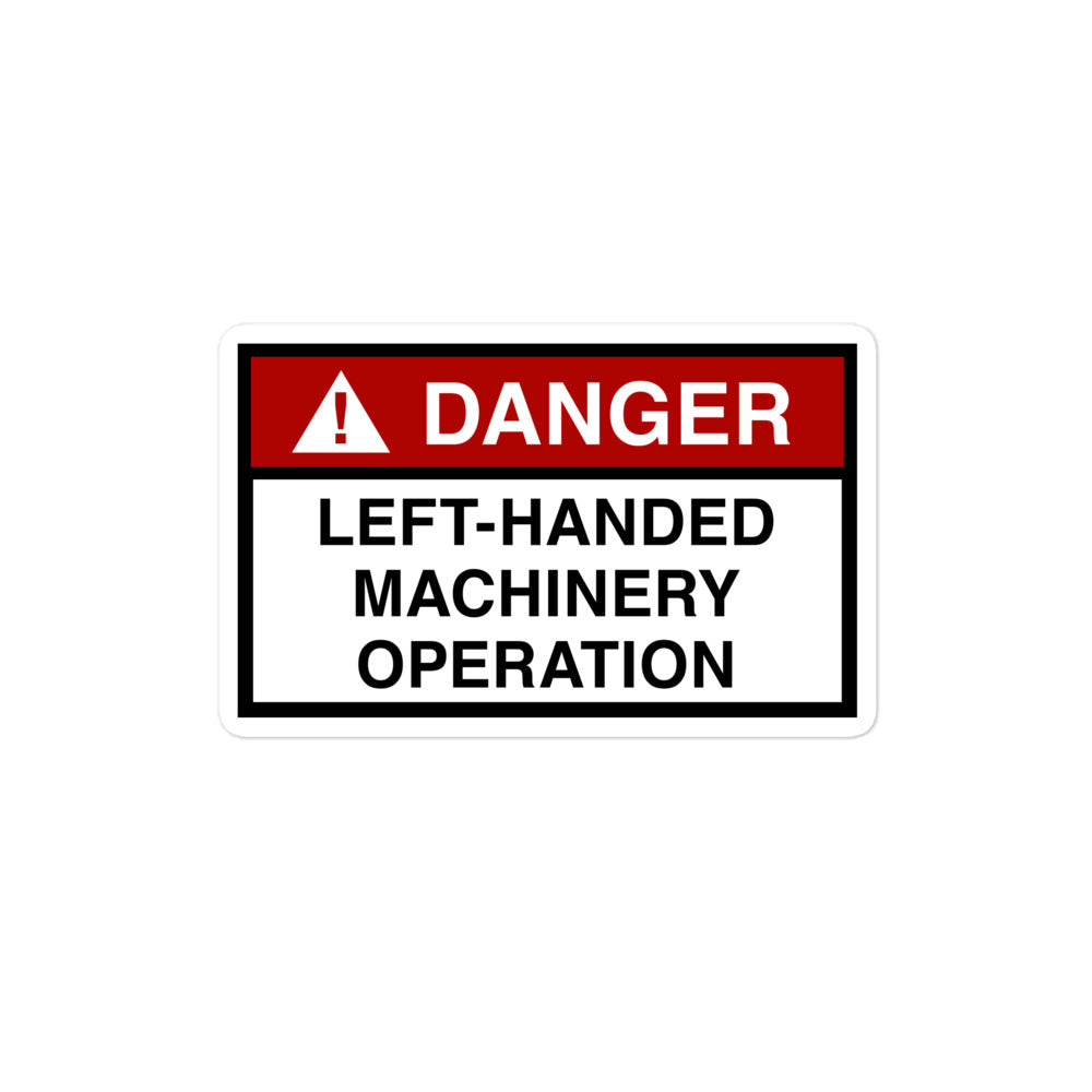 Durable vinyl sticker for left-handers featuring "Danger: Left-Handed Machinery Operation" hazard sign.
