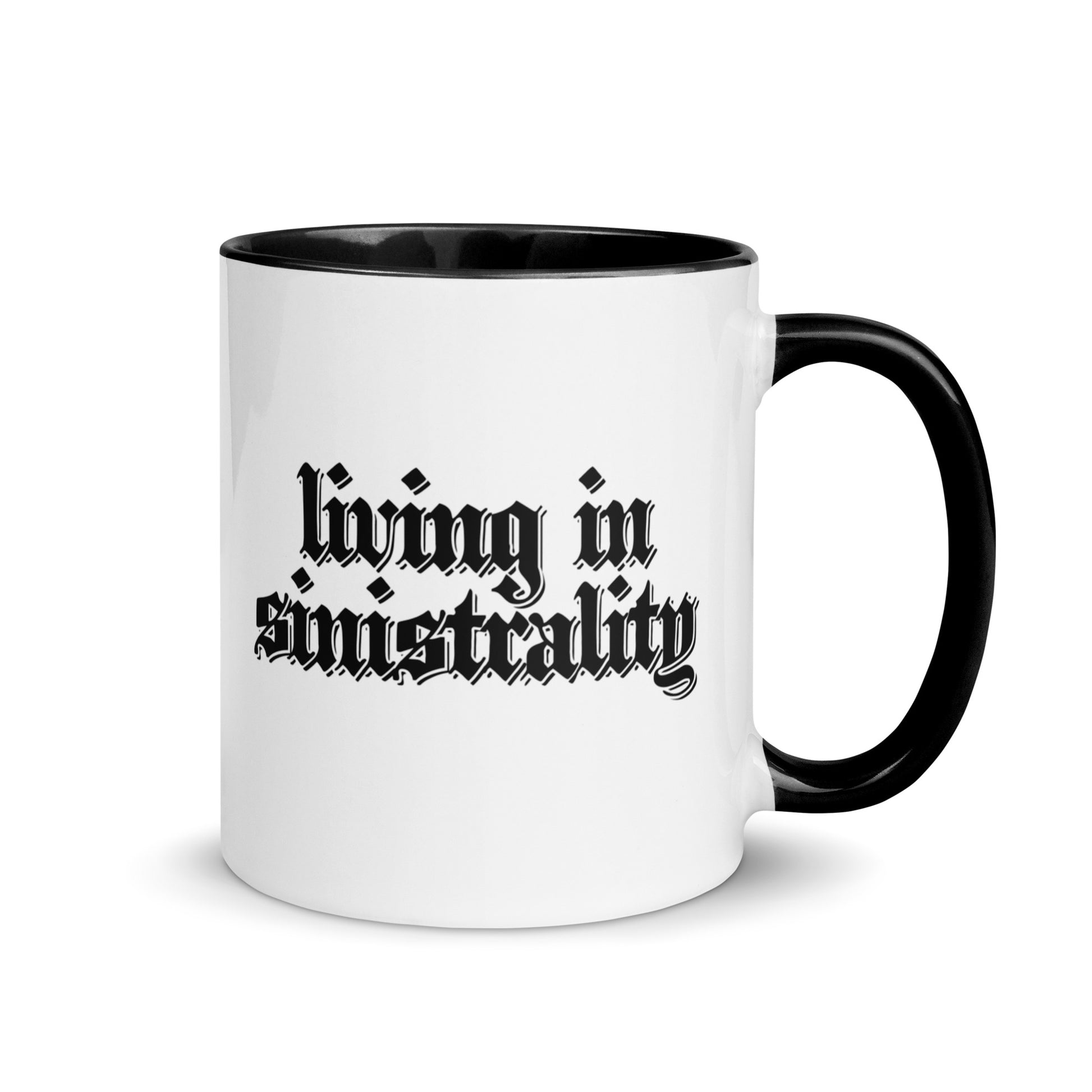 White ceramic mug for left-handers featuring black gothic text "Living in Sinistrality" with black handle and interior. mockup