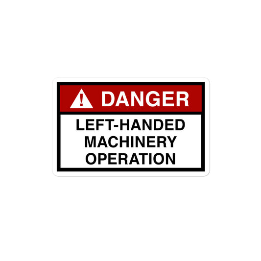 Vinyl sticker for left-handers featuring "Danger: Left-Handed Machinery Operation" hazard sign.
