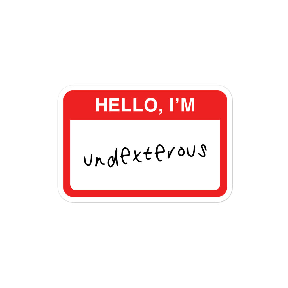 Vinyl sticker for left-handers featuring the statement "Hello, I'm Undexterous."