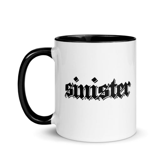 White ceramic mug for left-handers featuring black gothic text "Sinister" with black handle and interior.