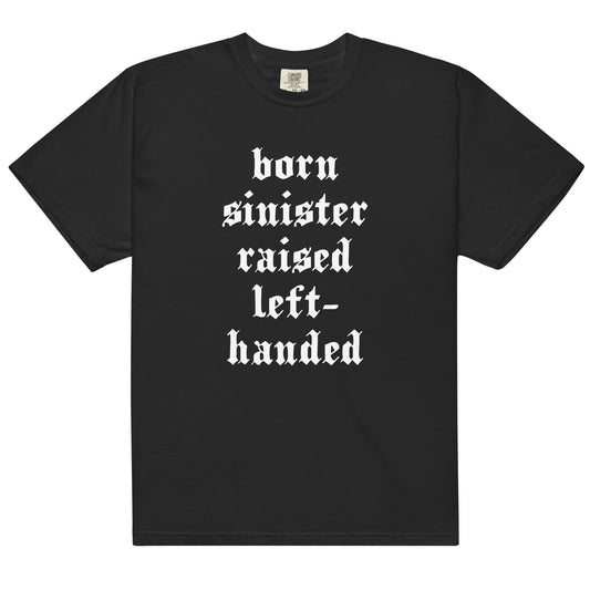 Black cotton t-shirt for left-handers featuring "Born Sinister Raised Left-Handed" in bold gothic font.