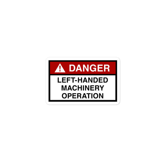 Durable vinyl sticker for left-handers featuring "Danger: Left-Handed Machinery Operation" hazard sign.