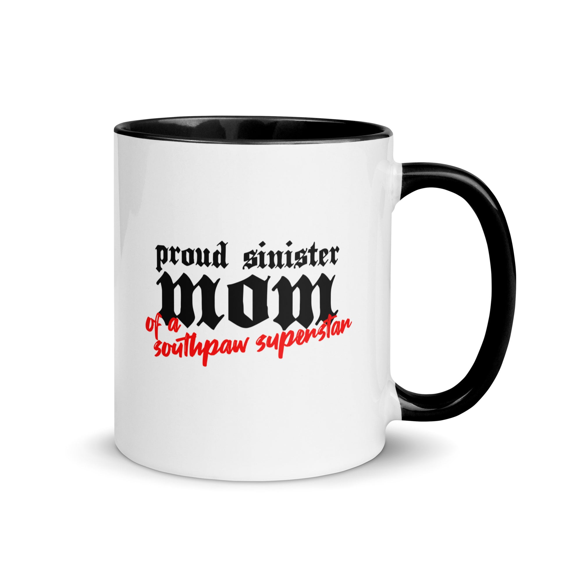 White ceramic mug for left-handers’ mom featuring black gothic text "Proud Sinister Mom of a Southpaw Superstar" with black handle and interior.