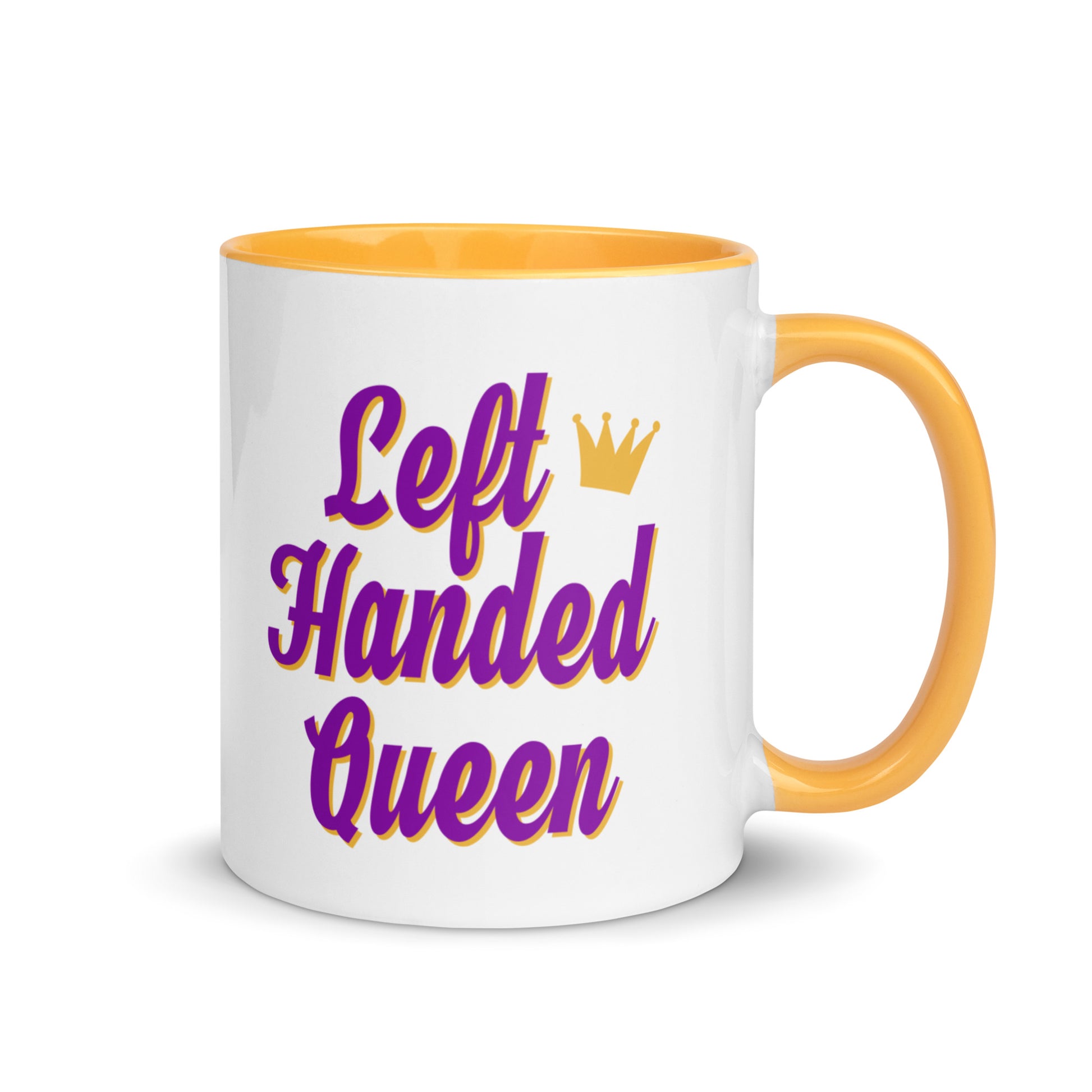 White ceramic mug for left-handers featuring a crown and the statement "Left-Handed Queen" in bold graphic text with golden yellow handle and interior.