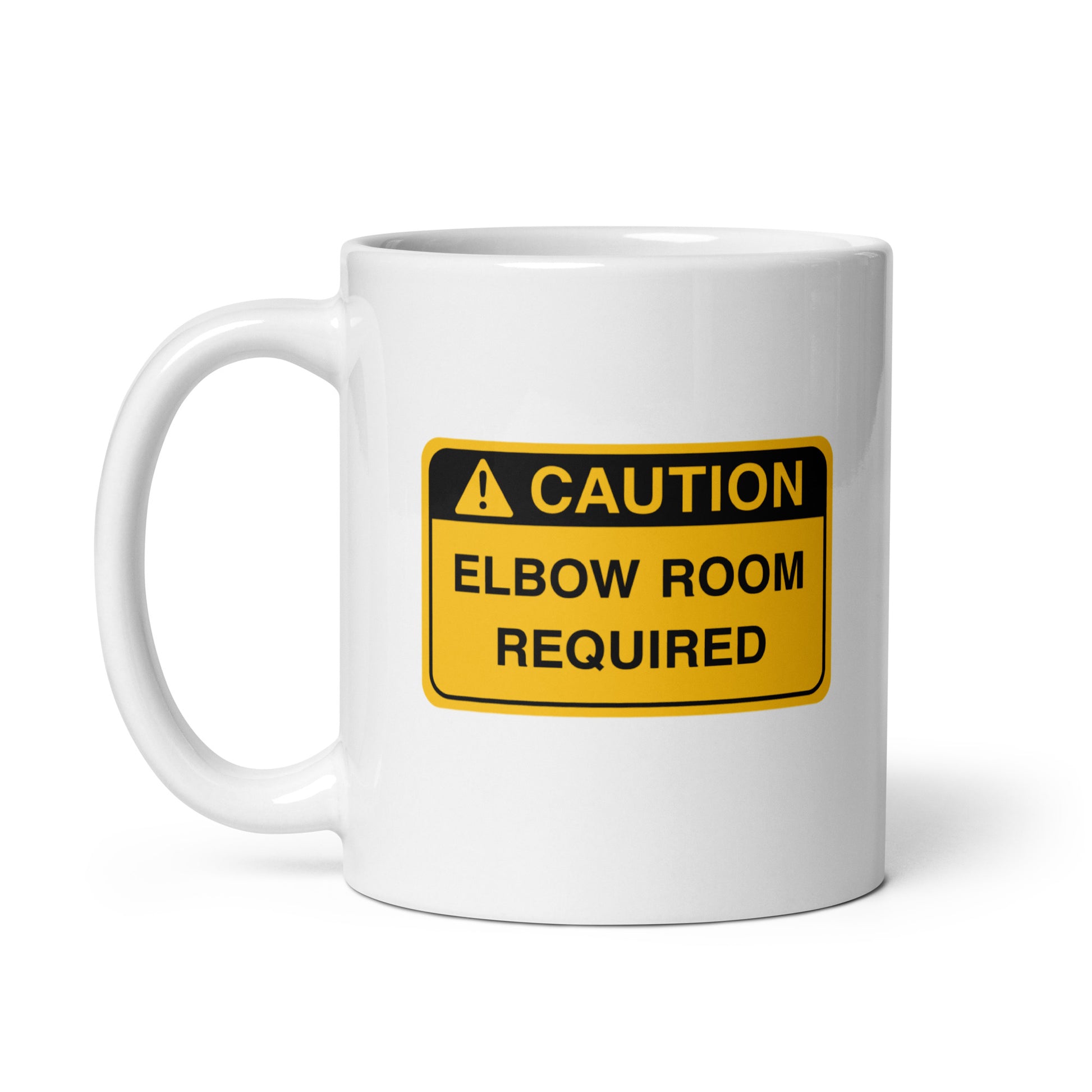 White ceramic mug for left-handers with a caution elbow room required hazard sign design