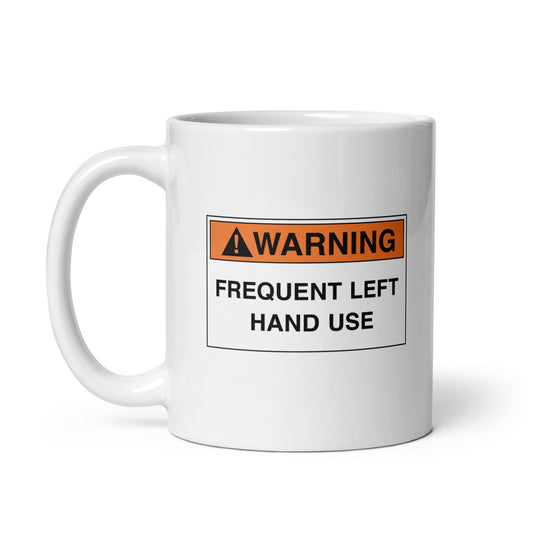 White ceramic mug for left-handers with a warning frequent left hand use hazard sign design