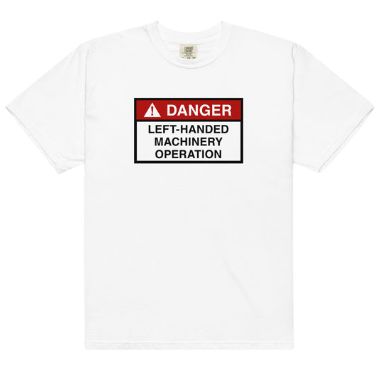 White cotton t-shirt for left-handers featuring "Danger: Left-Handed Machinery Operation" hazard sign. 